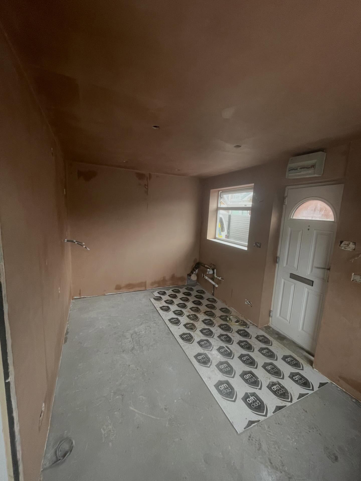 Freshly skimmed walls and ceiling by Alltek on a kitchen renovation in Darfield